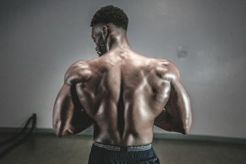 man flexing muscle